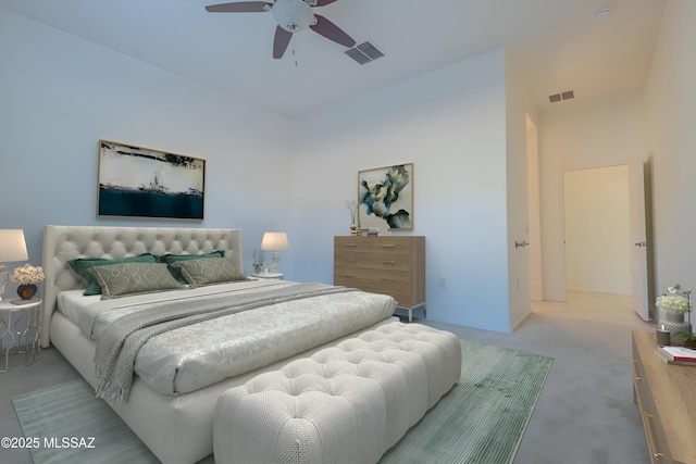 bedroom with ceiling fan and carpet floors