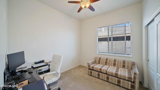 office with ceiling fan and light colored carpet