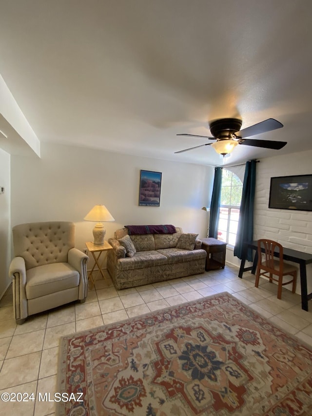 living room featuring ceiling fan and light tile patterned flooring