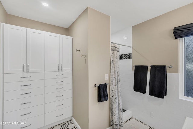 bathroom with curtained shower