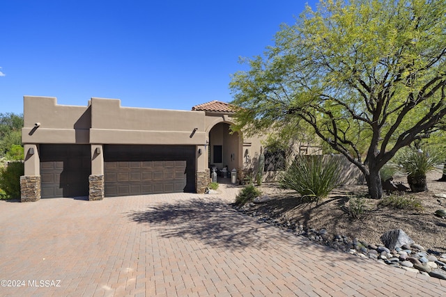 view of front of property featuring a garage