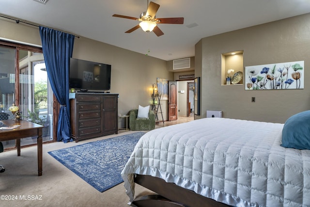 carpeted bedroom with access to outside and ceiling fan