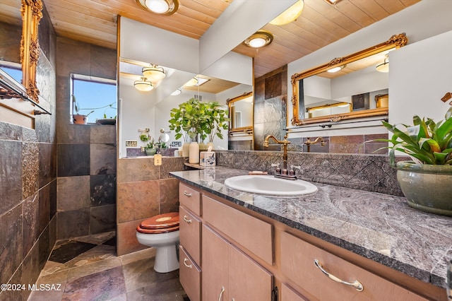 bathroom featuring walk in shower, toilet, vanity, wood ceiling, and tile walls