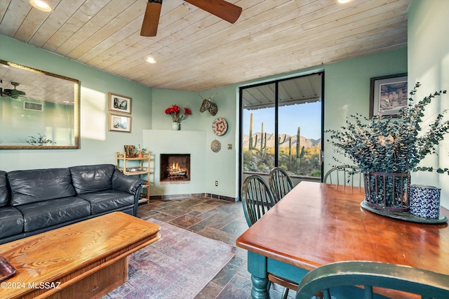 living room featuring wooden ceiling