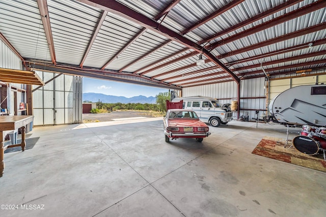 garage featuring a mountain view