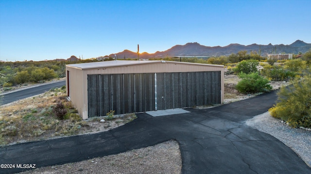 garage featuring a mountain view