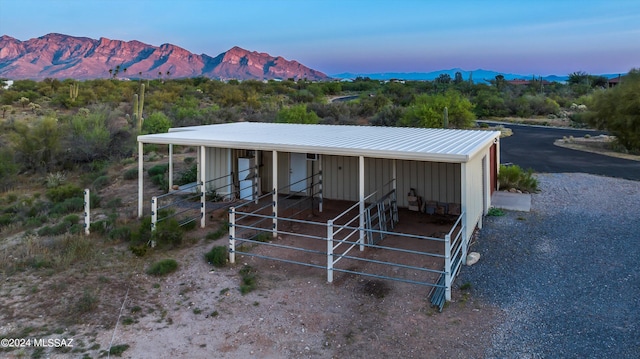 view of stable featuring a mountain view