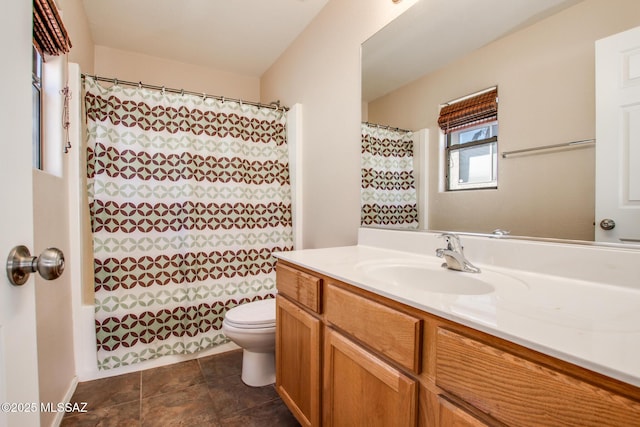 full bathroom featuring toilet, shower / tub combo with curtain, and vanity