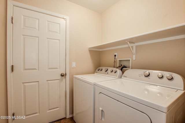 washroom featuring separate washer and dryer