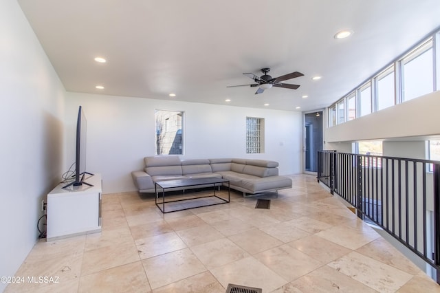 living room with ceiling fan