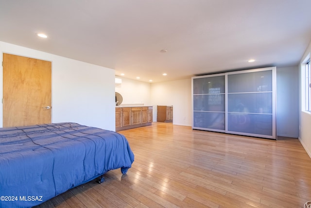 bedroom featuring light hardwood / wood-style floors