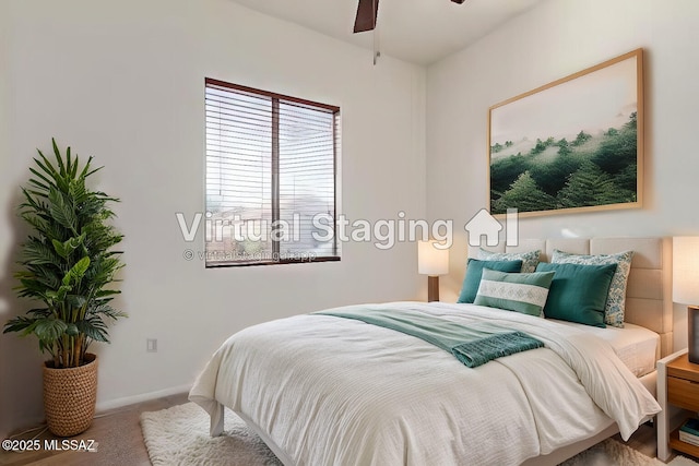 carpeted bedroom with ceiling fan