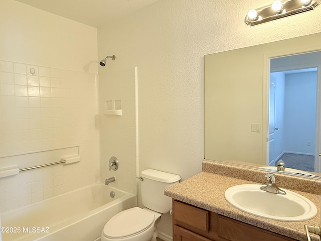 full bathroom with shower / tub combination, vanity, and toilet