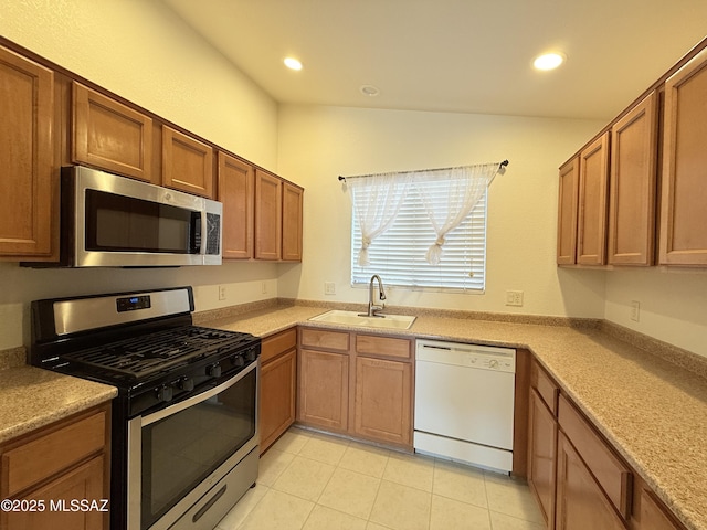 kitchen featuring stainless steel appliances and sink