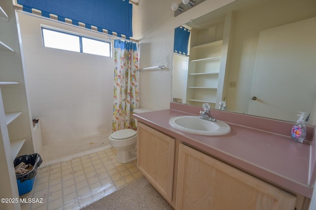 bathroom with a shower with curtain, vanity, and toilet