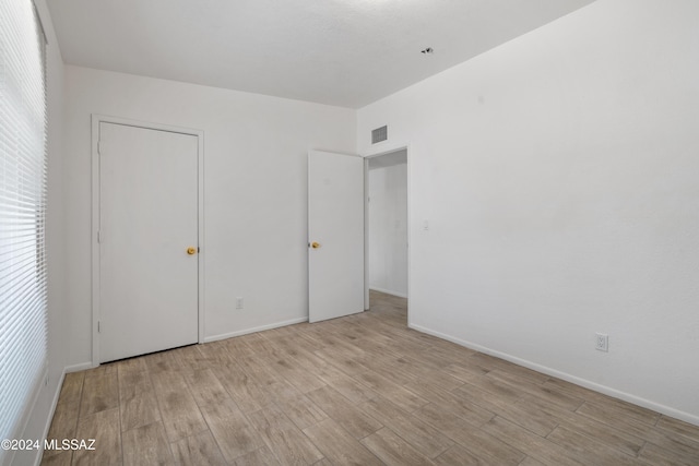 unfurnished bedroom with light hardwood / wood-style flooring