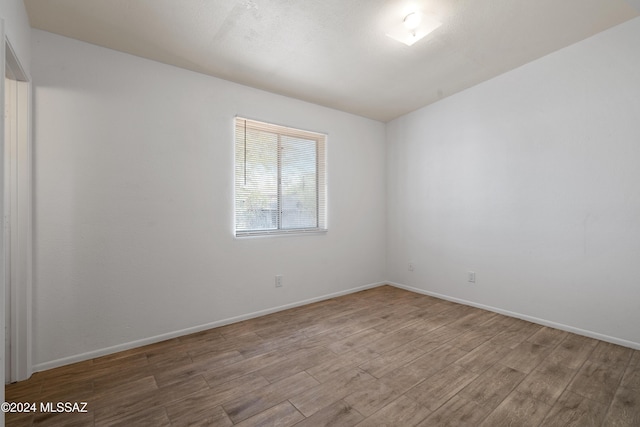 empty room with light wood-type flooring