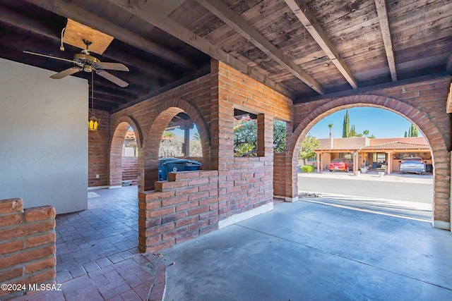 view of patio with ceiling fan and a grill