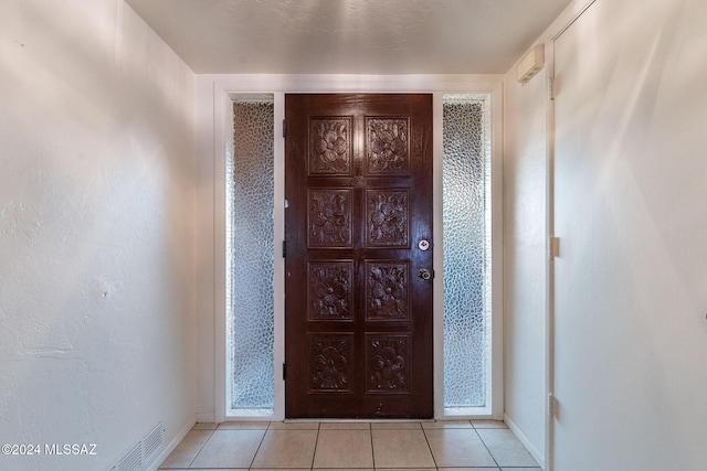 71 N Las Yucas, Green Valley, AZ 85614 - entryway featuring baseboards and light tile patterned floors