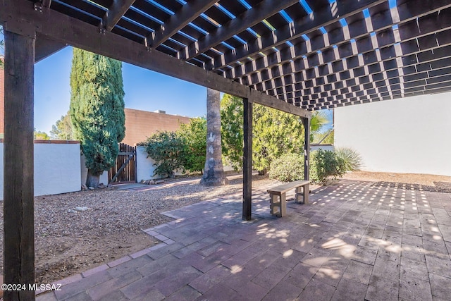 view of patio featuring a pergola