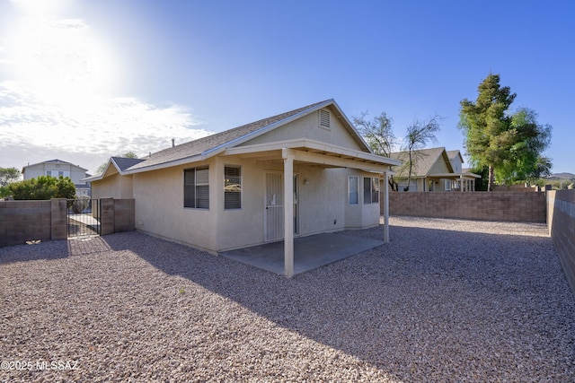 rear view of property with a patio area