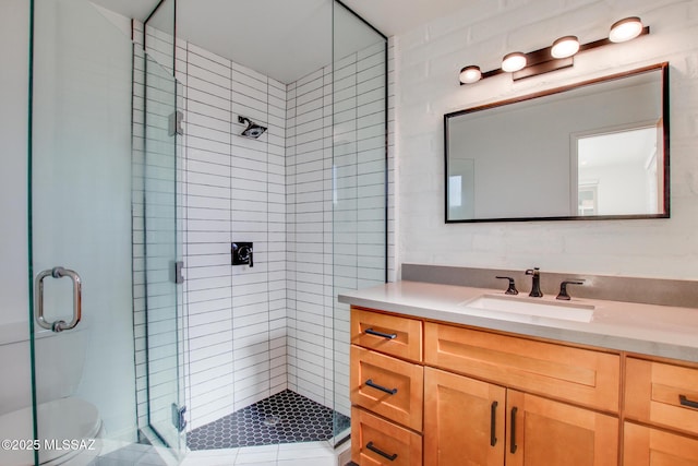 bathroom with vanity and an enclosed shower