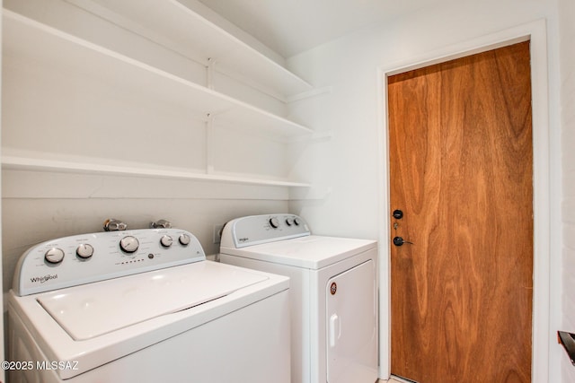 laundry area featuring separate washer and dryer