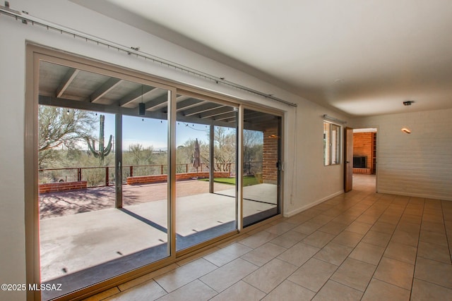 doorway featuring tile patterned floors