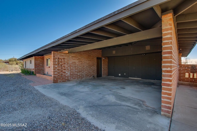 view of patio featuring a carport