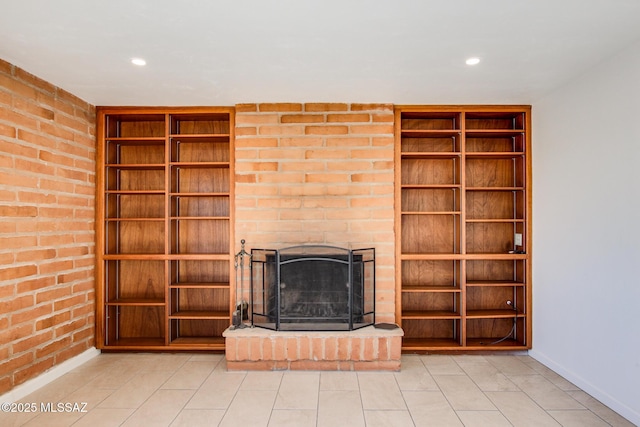 unfurnished living room with built in shelves and a fireplace