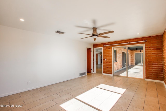 spare room featuring ceiling fan