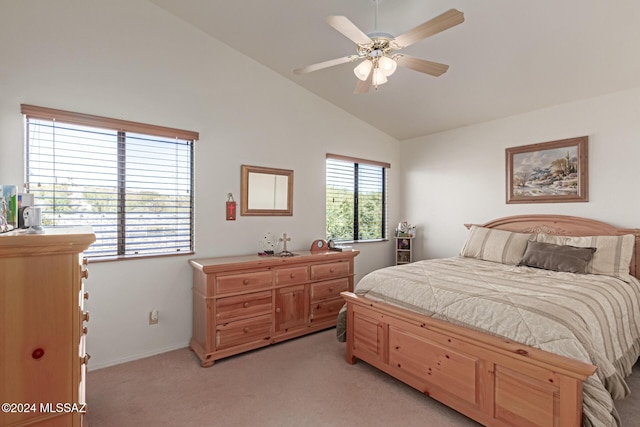 carpeted bedroom with ceiling fan and lofted ceiling