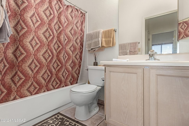 full bathroom featuring tile patterned floors, vanity, shower / bath combo, and toilet