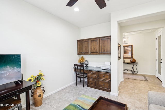 tiled office space with ceiling fan