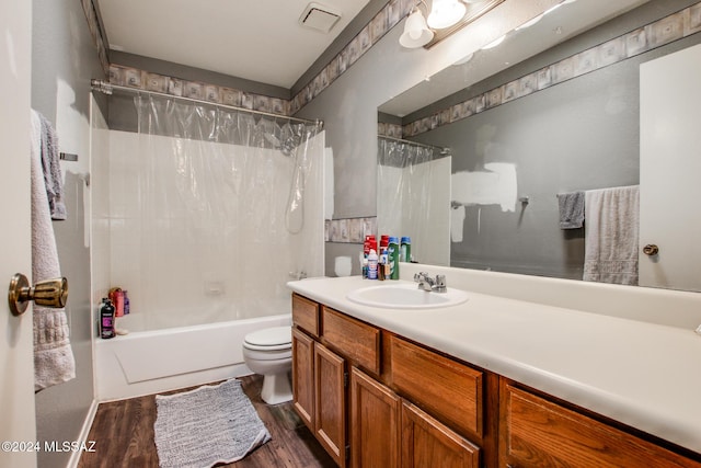 full bathroom featuring toilet, vanity, shower / bath combination, and wood-type flooring