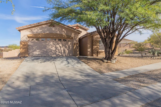 view of front of home featuring a garage