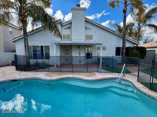 view of pool featuring a patio area