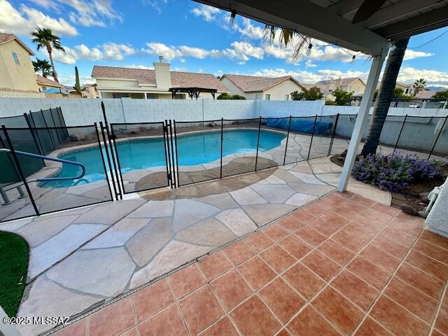 view of yard featuring a fenced in pool