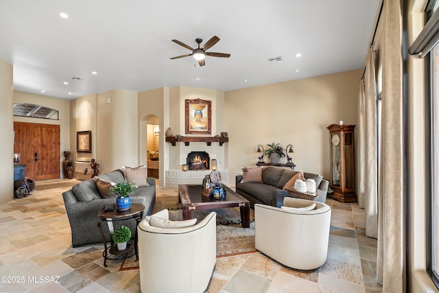 living room with ceiling fan