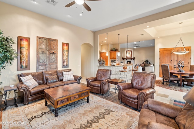 living room featuring ceiling fan