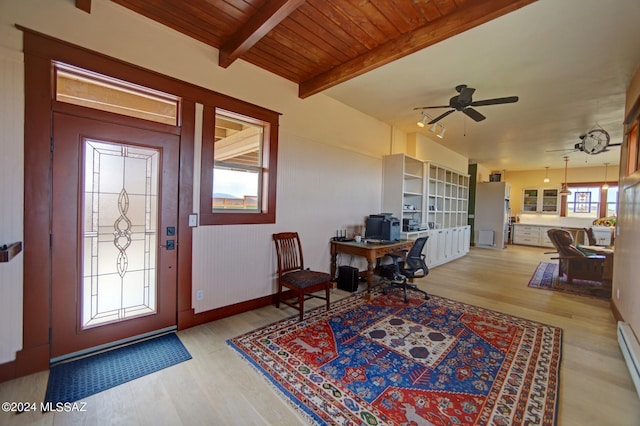 foyer entrance featuring beamed ceiling, ceiling fan, light wood-type flooring, and wooden ceiling