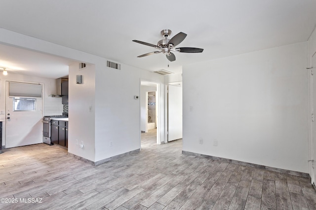 spare room featuring ceiling fan