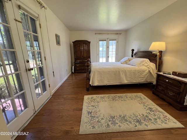 bedroom featuring access to exterior, french doors, and dark hardwood / wood-style flooring