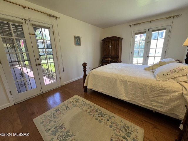 bedroom with access to exterior, french doors, and dark wood-type flooring