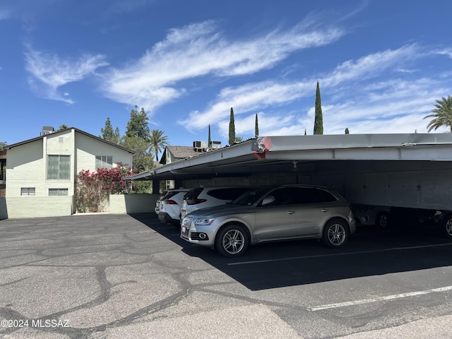 view of parking featuring a carport