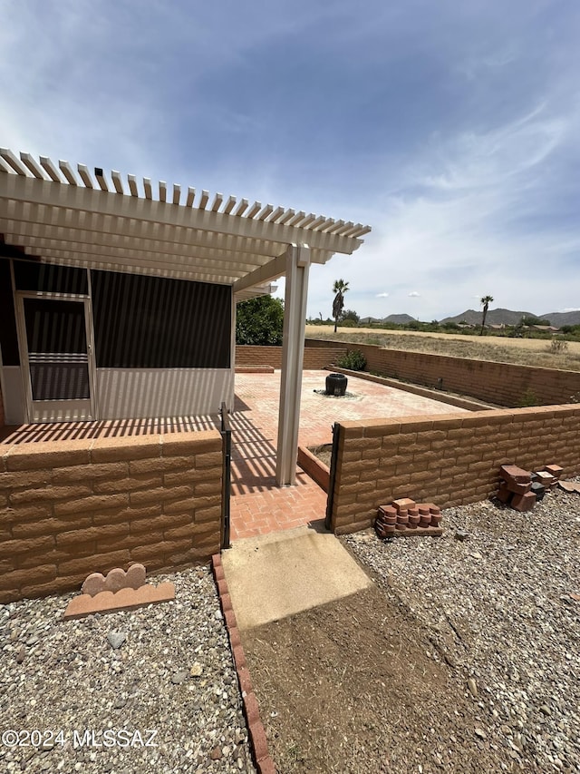 view of patio / terrace featuring a pergola