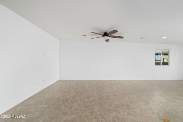 empty room featuring ceiling fan