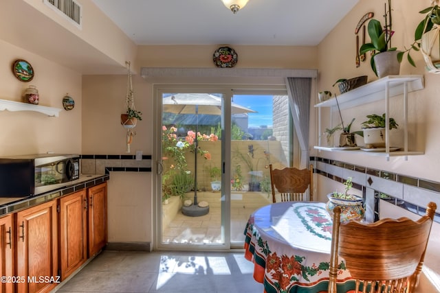 view of tiled dining space