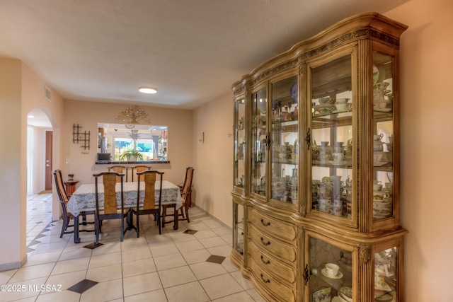 dining room featuring light tile patterned floors