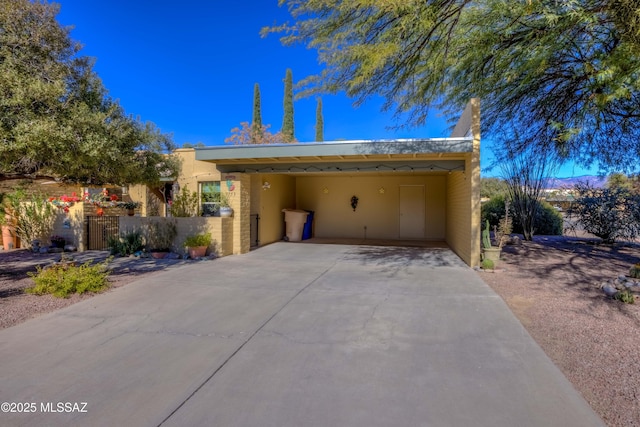 exterior space featuring a carport